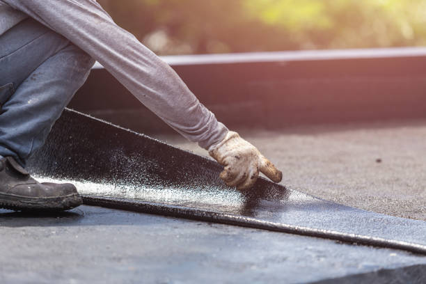 Professional Waterproofing technician working in Juneau, WI